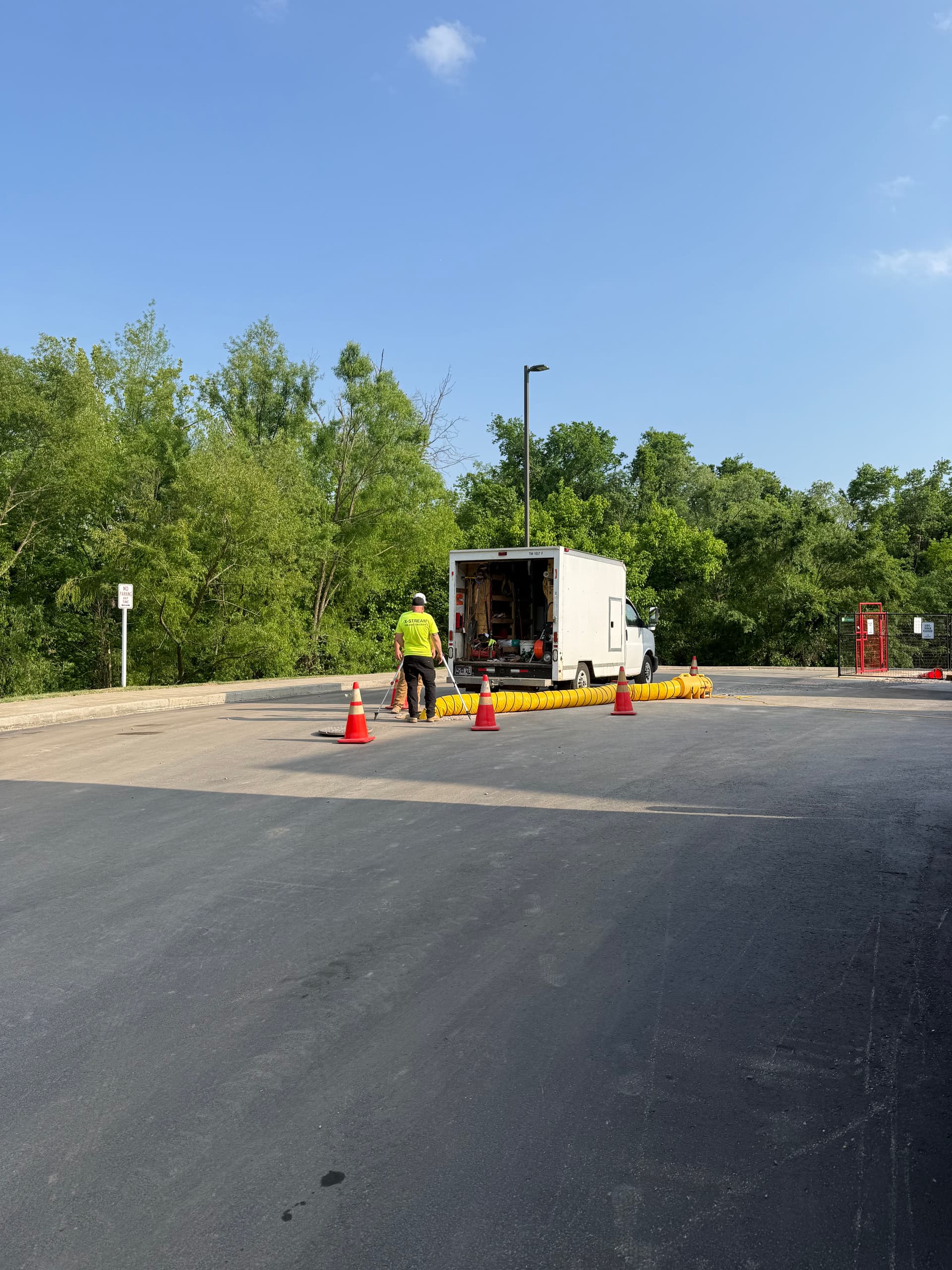 Hydro Jetting New Construction Lines from Manhole Access image