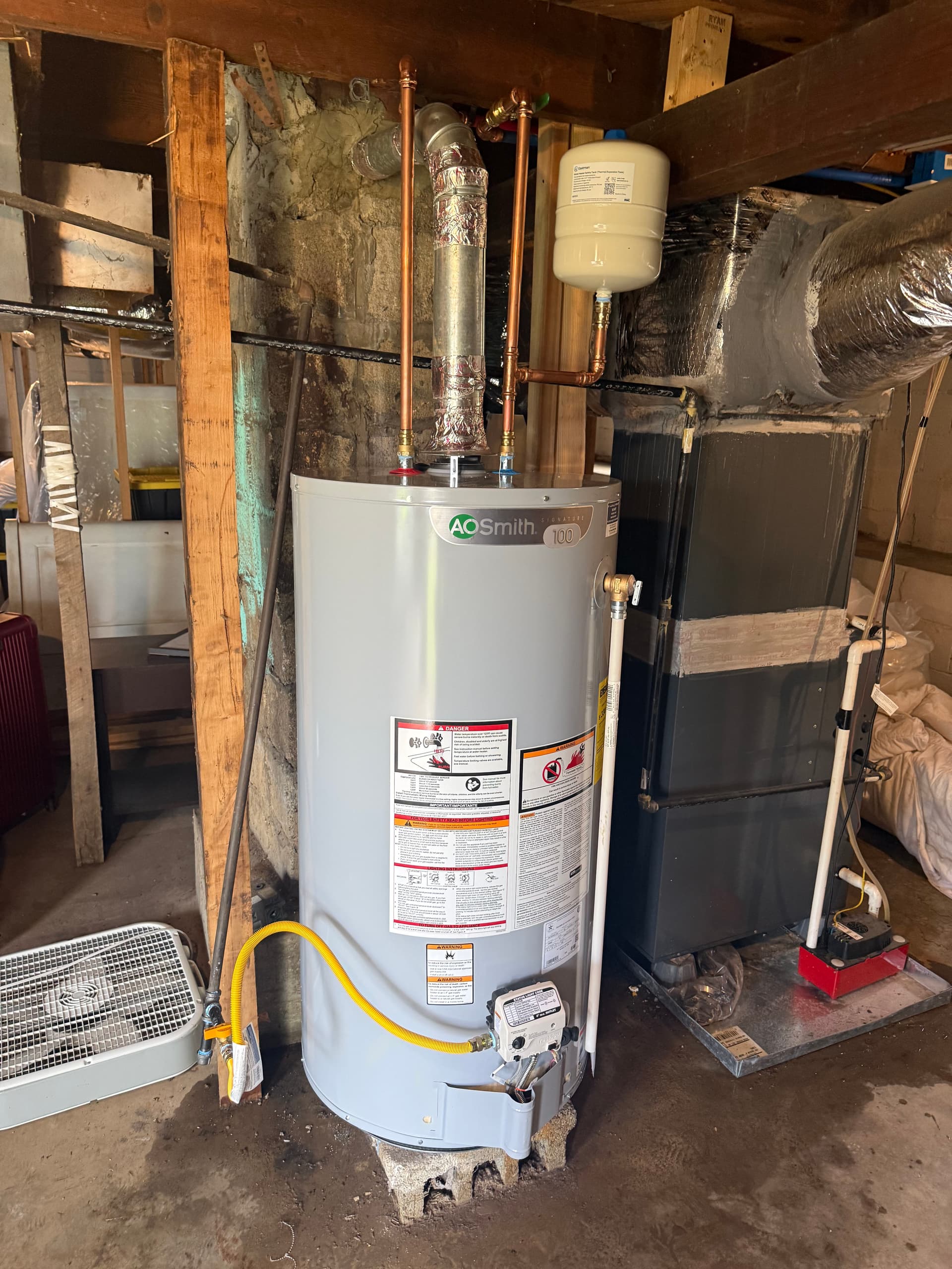 Old Gas Water Heater Swapped Out for a Fresh AO Smith Unit