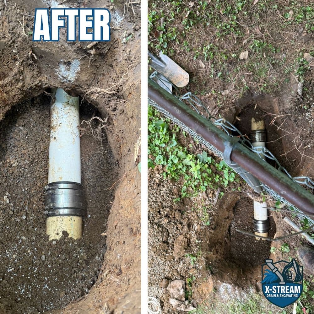 After excavation, a repaired pipe is visible in freshly dug soil beside a fence.