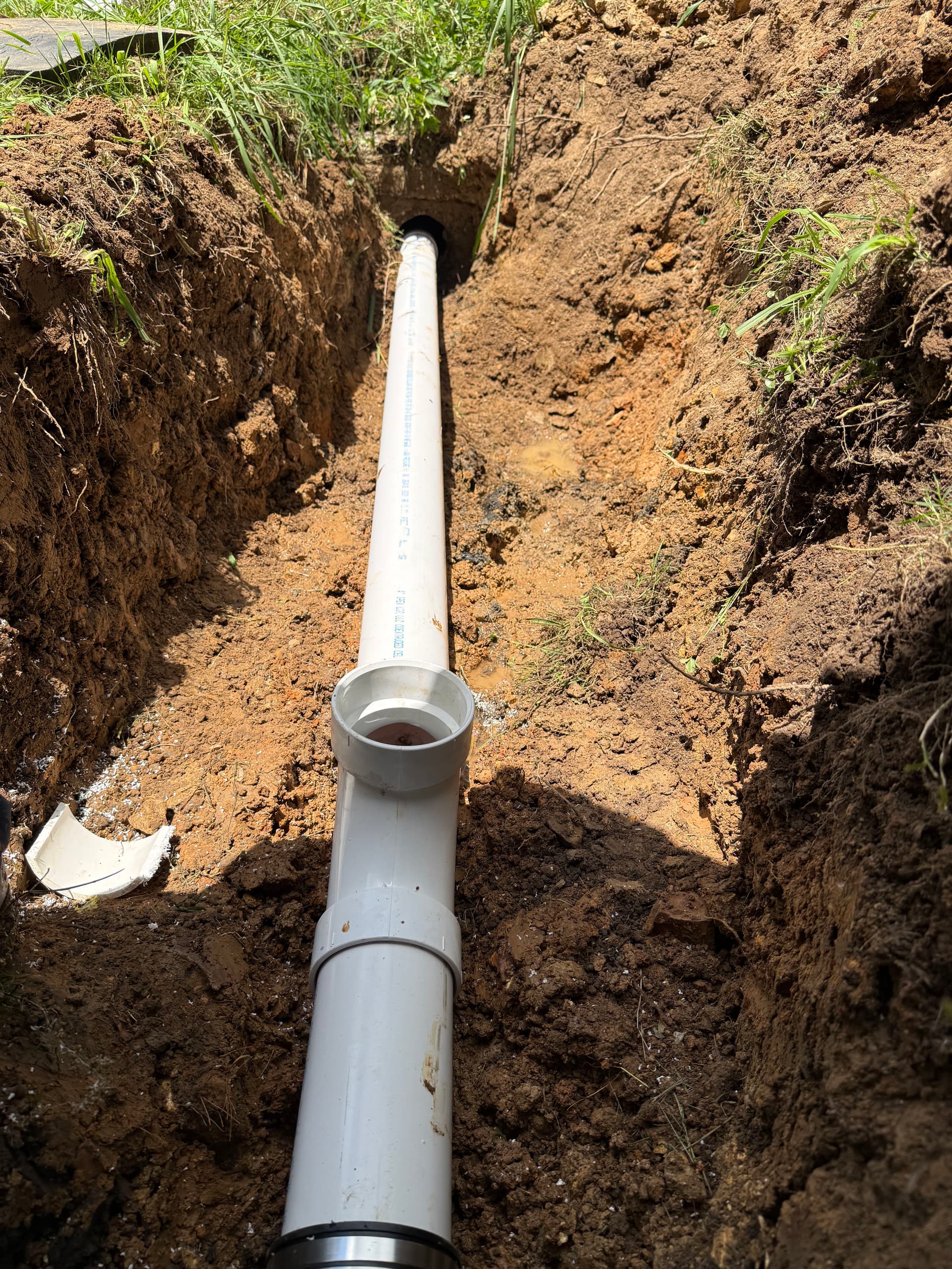 Corroded Cast Iron Sewer Line Replaced With New PVC image